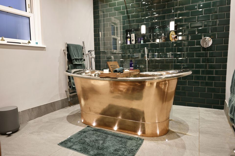 The bathroom features a stunning and eye-catching tub