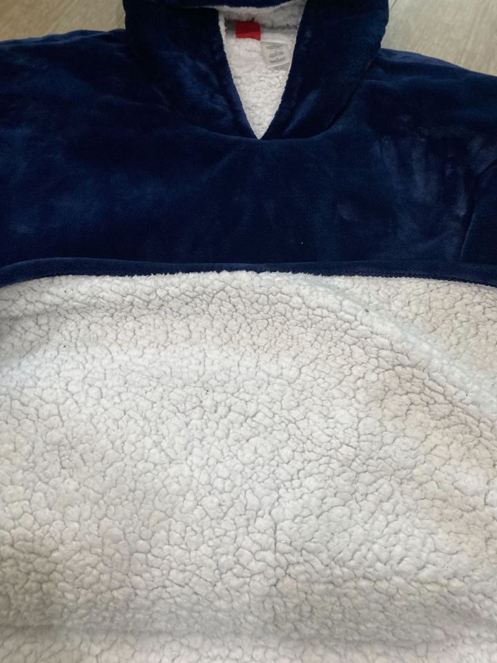 a blue hoodie with a white sherpa lining