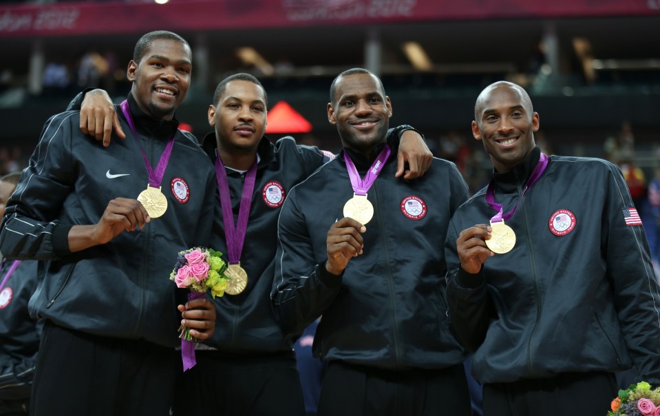 Kevin Durant (left), Carmelo Anthony (second left), James (second right) and the late great Kobe Bryant (right) celebrate their London 2012 gold medal