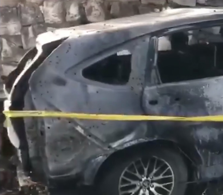 The burnt wreckage of the dead commander's car today