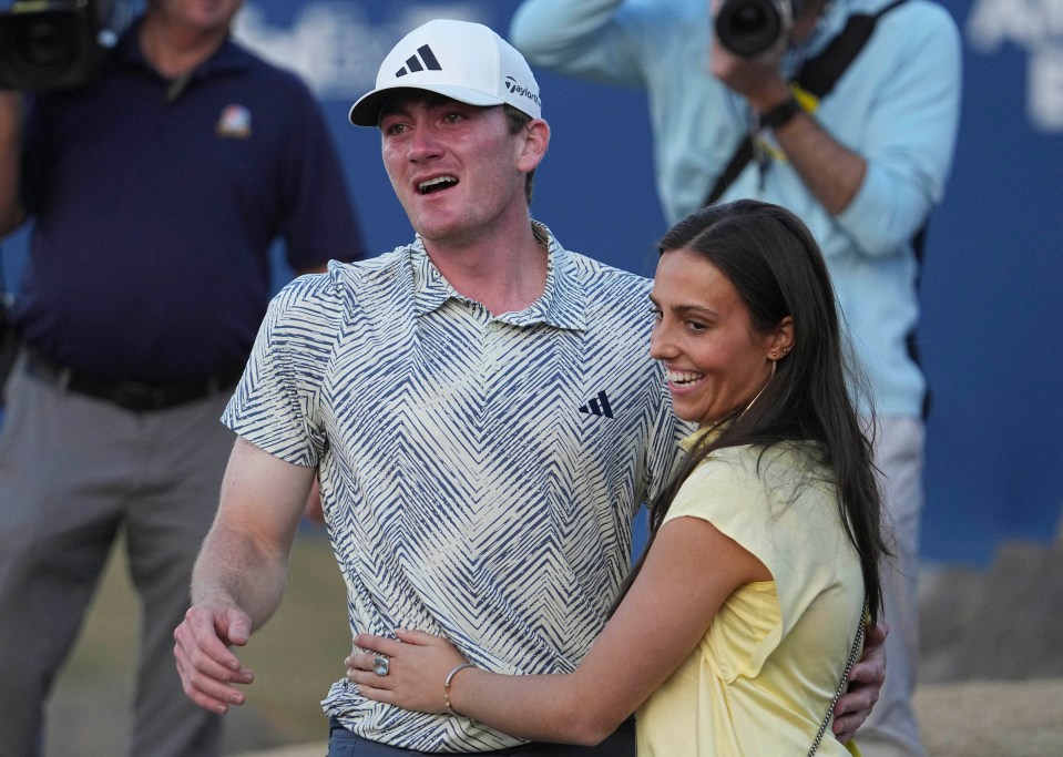 Dunlap celebrates with his girlfriend, Isabella Ellis, at the PGA West Stadium Course