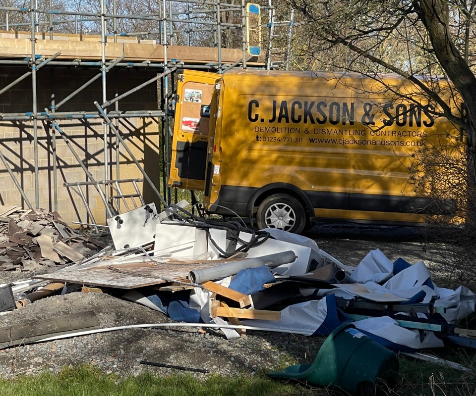 The guts of the building are abandoned outside as the demolition works get underway