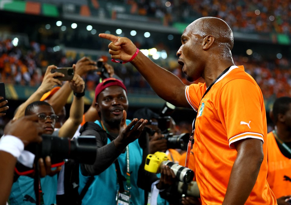 Chelsea legend Didier Drogba celebrated wildly