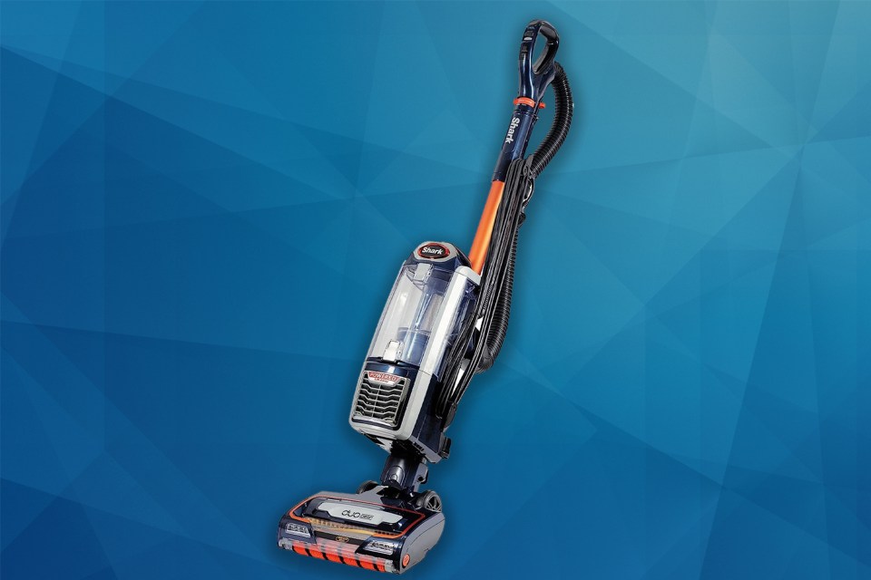 a shark vacuum cleaner on a blue background