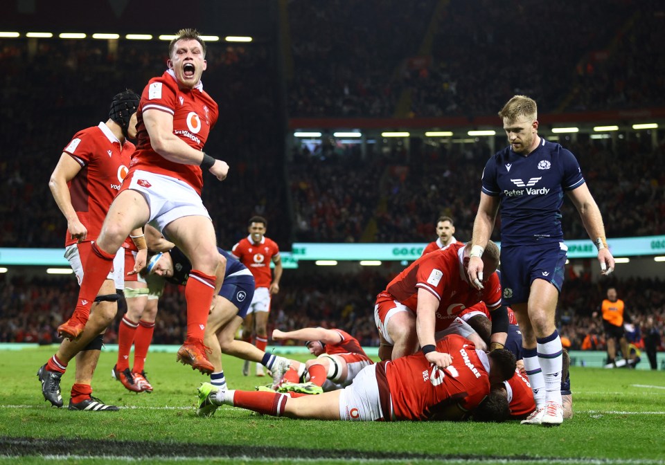 Rugby Union - Six Nations Championship - Wales v Scotland - Principality Stadium, Cardiff, Wales, Britain - February 3, 2024 Wales' Alex Mann scores their fourth try and Wales' Nick Tompkins celebrates REUTERS/Carl Recine