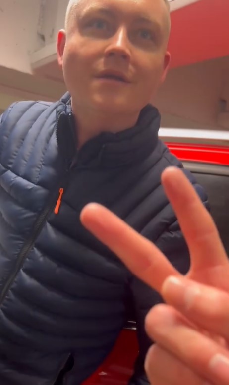 The man appeared to try and grab Owen's phone as he demanded he stopped filming