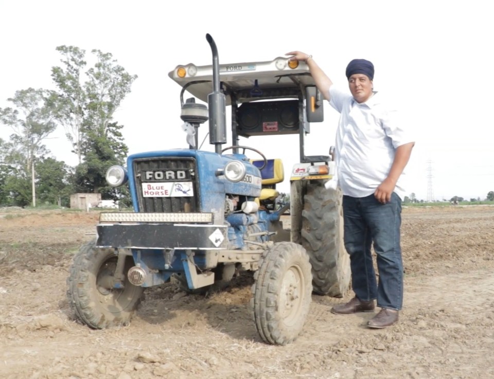 The giant farmer lives in India and stands at 7ft 3 in tall