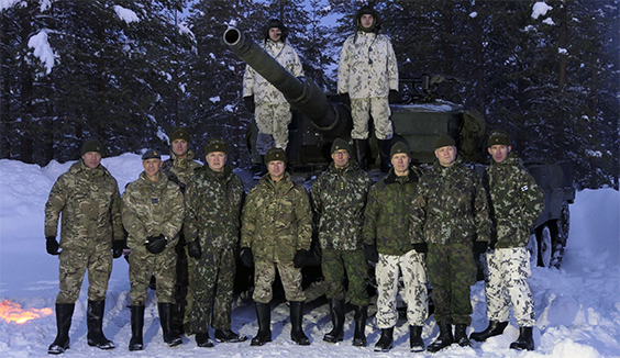British troops (pictured) are seen training with Finland's elite snow forces