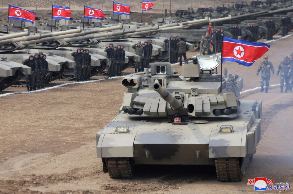 North Korean leader Kim Jong Un sits inside a tank during a military demonstration involving tank units, in North Korea, March 13, 2024 in this picture released on March 14, 2024, by the Korean Central News Agency. KCNA via REUTERS ATTENTION EDITORS - THIS IMAGE WAS PROVIDED BY A THIRD PARTY. REUTERS IS UNABLE TO INDEPENDENTLY VERIFY THIS IMAGE. NO THIRD PARTY SALES. SOUTH KOREA OUT. NO COMMERCIAL OR EDITORIAL SALES IN SOUTH KOREA.