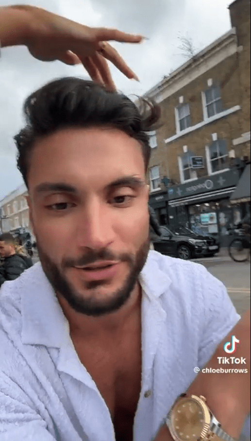 Chloe gently caressed his hair towards the end of the video