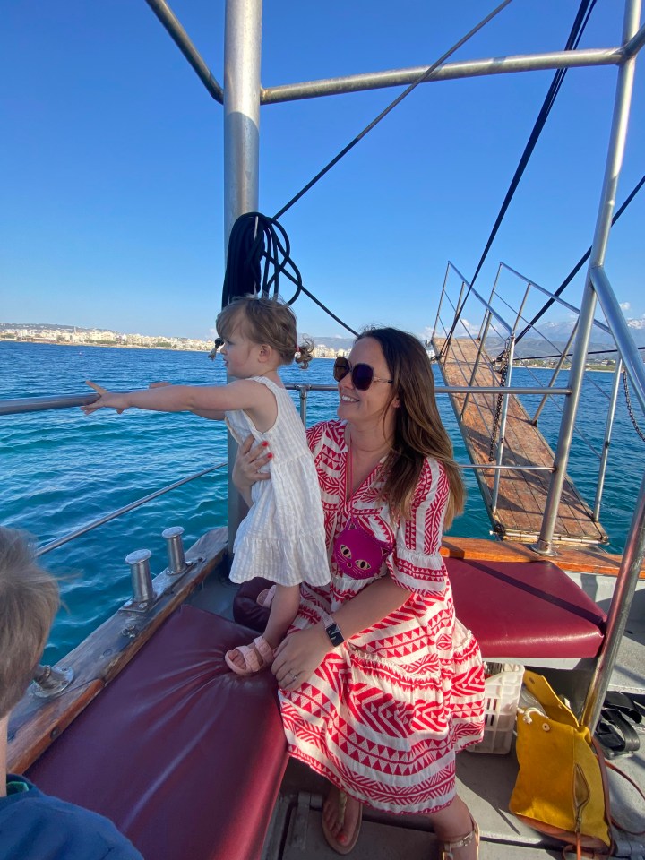 Helen with Isobel enjoy a spot of sailing