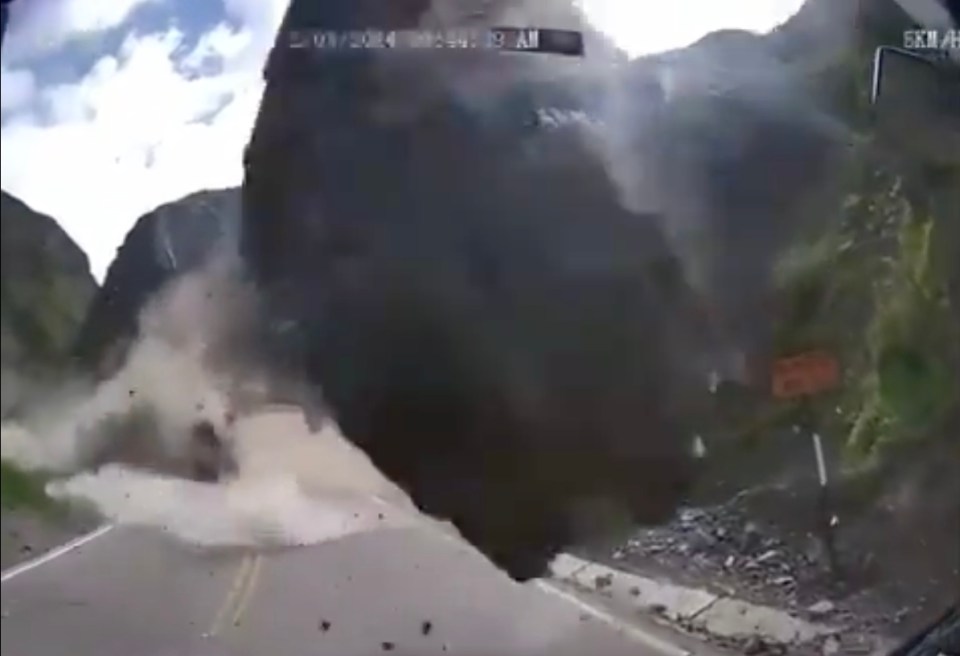 Another giant rock slid down the mountain in front of the second truck