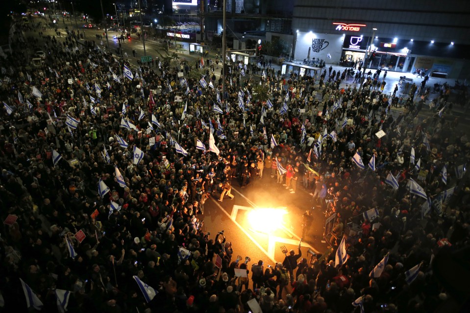 People gather in protest against Netanyahu and his government in Tel Aviv, Israel