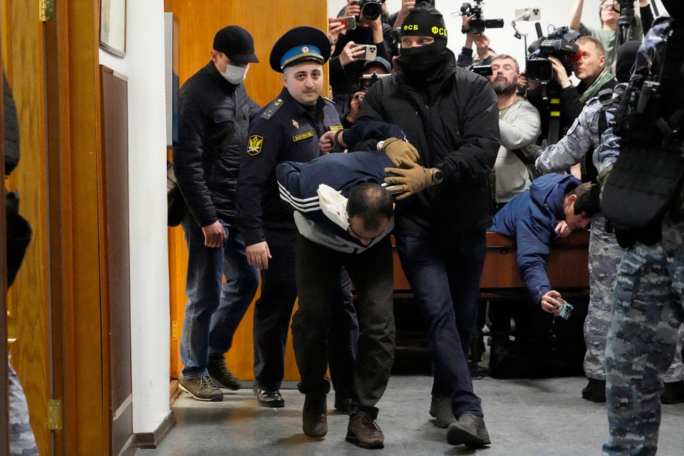 He was seen being escorted by police and FSB officers in the Basmanny District Court on Sunday