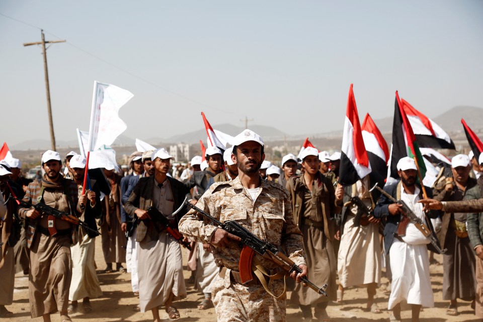 SANA'A, YEMEN - FEBRUARY 4: Houthi fighters participate in a rally in support of Palestinians in the Gaza Strip, and the recent Houthi strikes on shipping in the Red Sea and Gulf of Aden on February 4, 2024, on the outskirts of Sana'a, Yemen. The rally comes amid U.S. and British strikes against 36 Houthi targets in Yemen on Saturday, the second day of major U.S. attacks following an attack on American troops last weekend that killed three U.S. soldiers at a remote post in Jordan just across the border with Iraq by fighters with links to Iran. (Photo by Mohammed Hamoud/Getty Images)