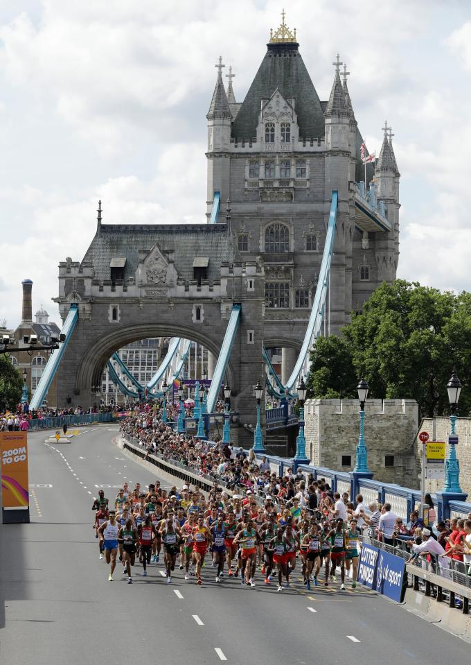 Marathon runners crossing Tower Bridge.