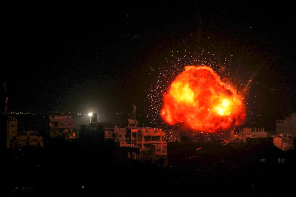 A fireball erupts during Isreali bombardment on Rafah in the southern Gaza Strip