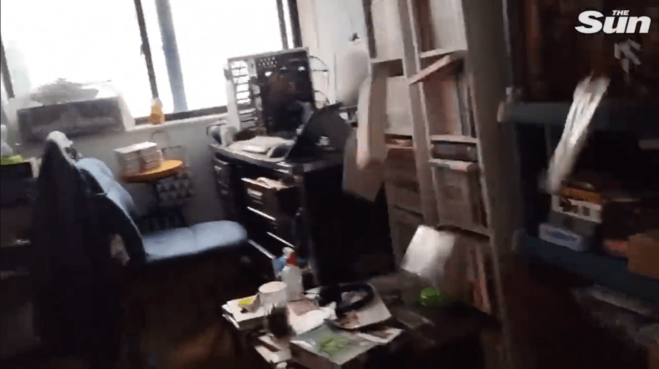 Books fly from shelves onto the floor as the quake shakes the earth