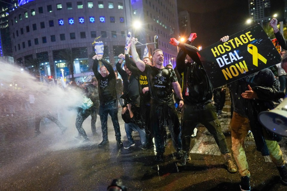 Police used water cannons to disperse demonstrators as they demanded a hostage deal immediately