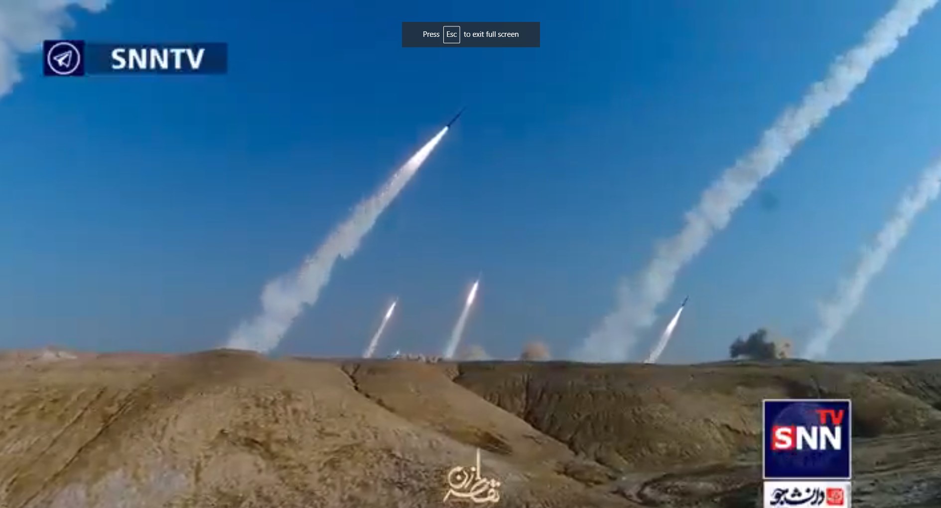 A clip shows missiles being released in quick succession