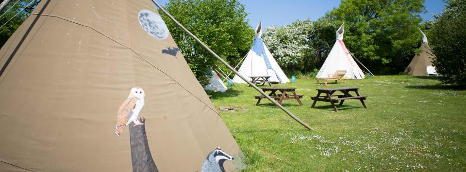 Located in Trelill in Cornwall, Cornish Tipi Holidays is surrounded by a woodland valley