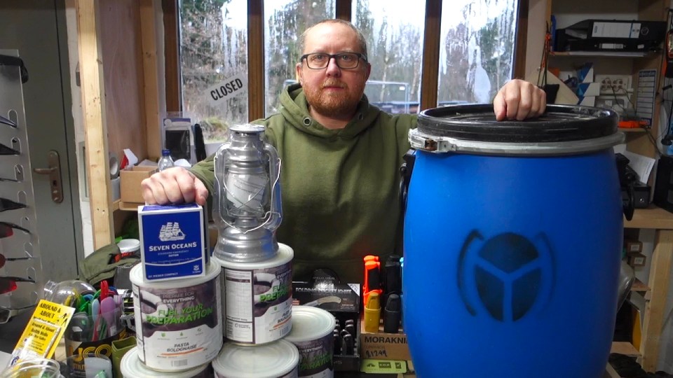 Leigh Price from The Bug Out store stands with some of the products he sells