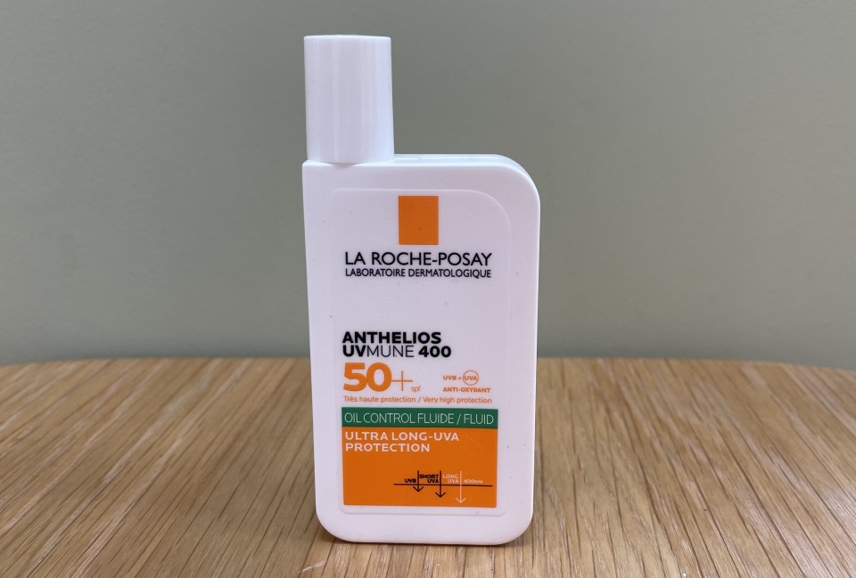 A bottle of La Roche Posay sunscreen on a white background