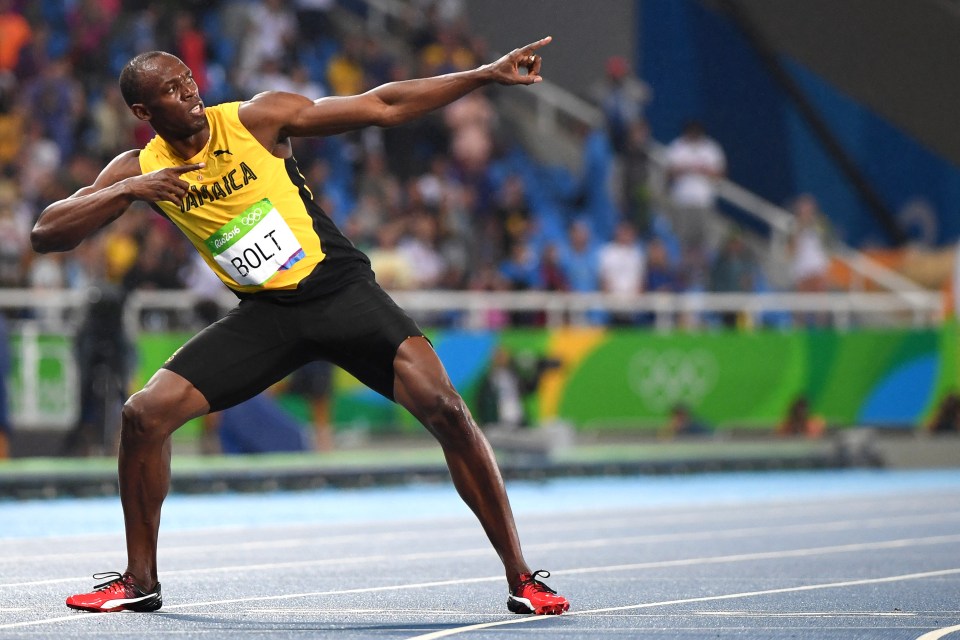 (FILES) Jamaica's Usain Bolt does his "Lightening Bolt"pose after he won the Men's 200m Final during the athletics event at the Rio 2016 Olympic Games at the Olympic Stadium in Rio de Janeiro on August 18, 2016. Jamaica's Usain Bol best-known as "Lightning Bolt" smashed the world records at the Beijing Games in 2008 for the 100m and 200m, going on to better his times a year later and making him to date the record holder in both. (Photo by OLIVIER MORIN / AFP) (Photo by OLIVIER MORIN/AFP via Getty Images)