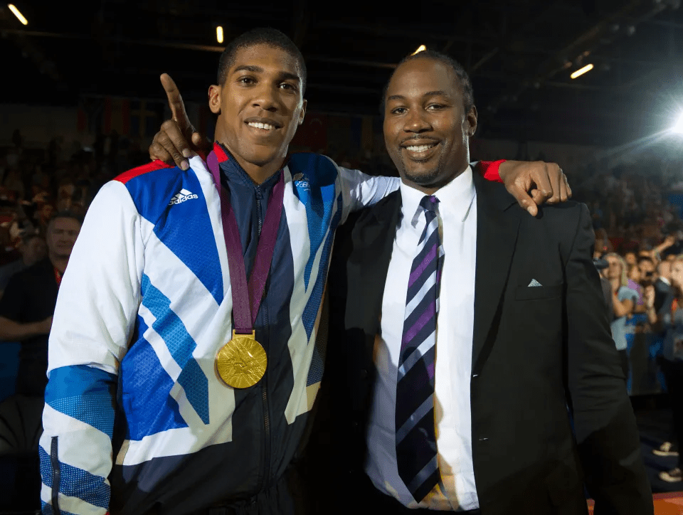 Anthony Joshua with Lennox Lewis in 2012
