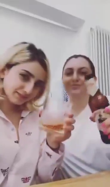 The daughters of a woman killed by Iranian security forces cheers to news of the helicopter crash