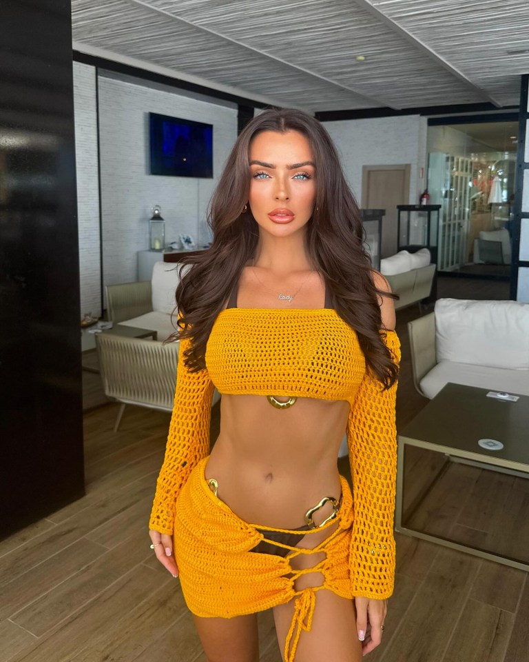 The show showed off her incredible figure in a crochet orange two piece