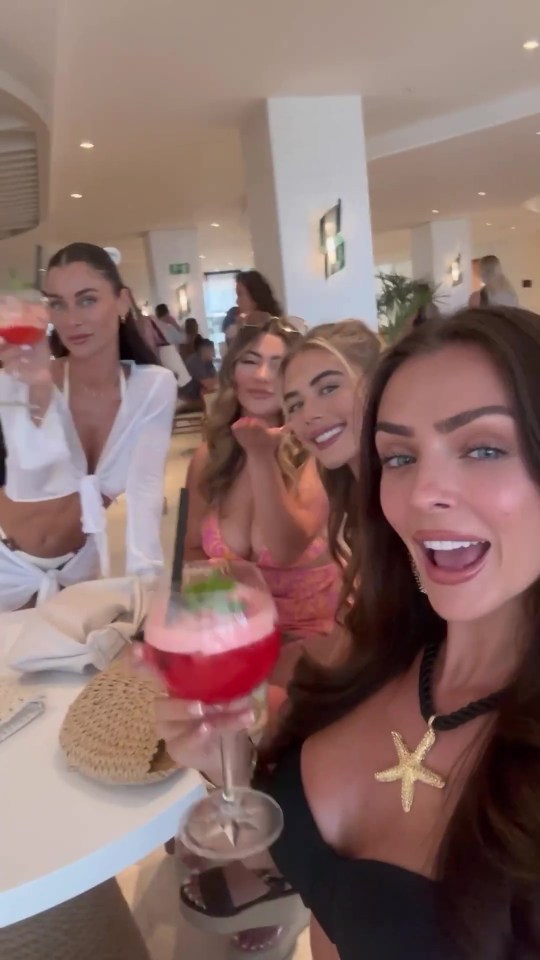 The star is enjoying drinks and good times in Marbella with friends