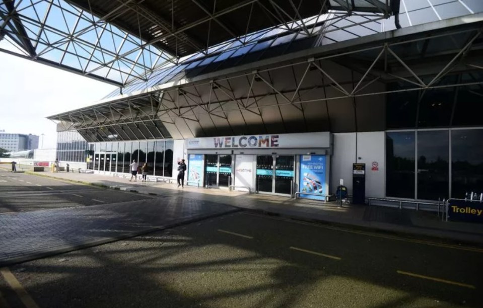 a large building with a welcome sign on it