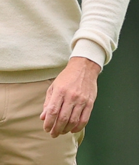McIlroy, pictured without his wedding ring, was shooting a practice round ahead of the PGA Championship