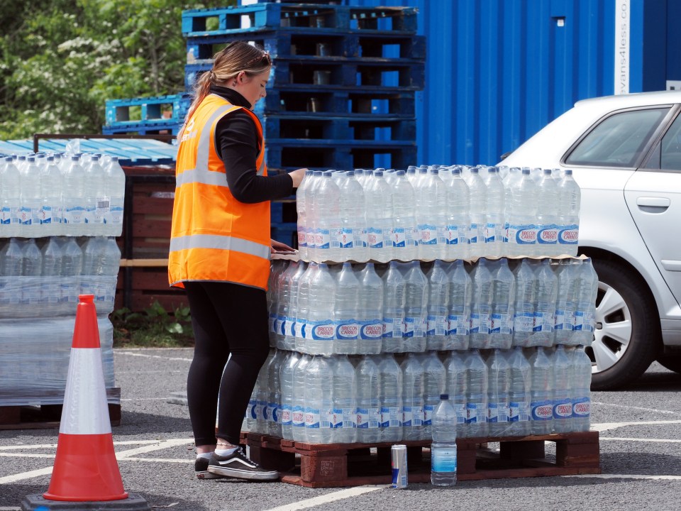 After the boil water order went out, emergency bottled water pick-up locations sprung up for locals to get hold of clean drinking water