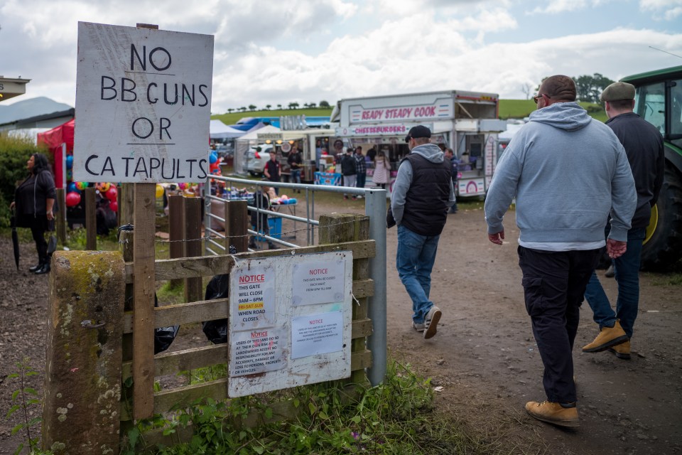 A sign warns attendees not to use BB guns or catapults on Saturday