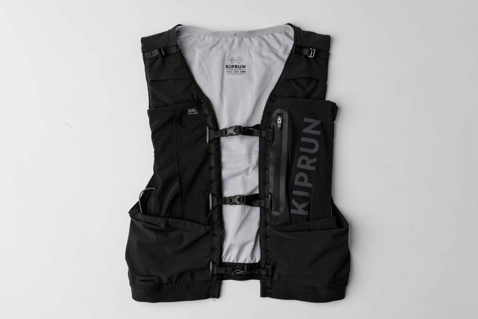 A vest with a hood and a zipper.