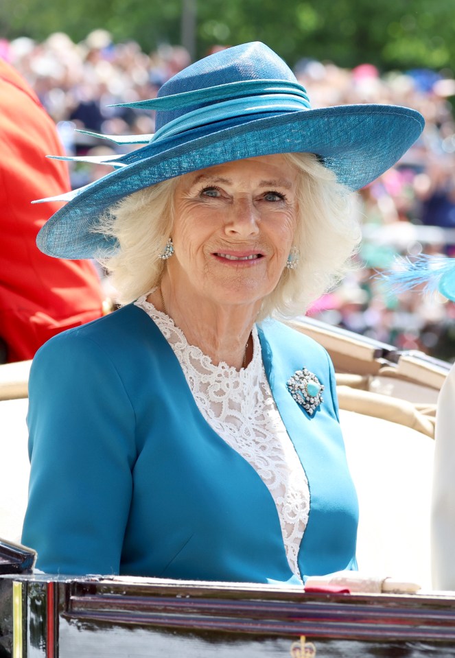 Camilla enjoys the ride on the open carriage at Ascot