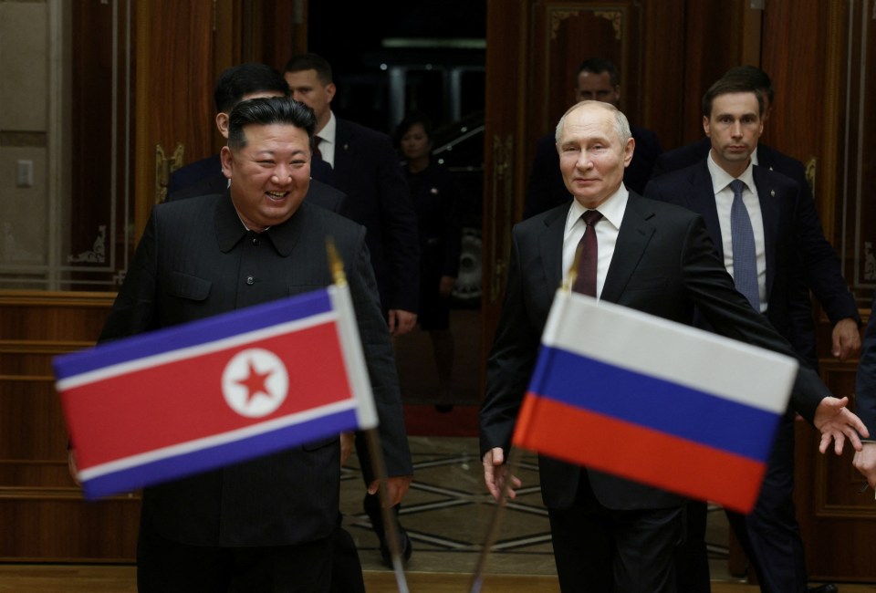 Russia's President Vladimir Putin is greeted by North Korea's leader Kim Jong Un during a state visit