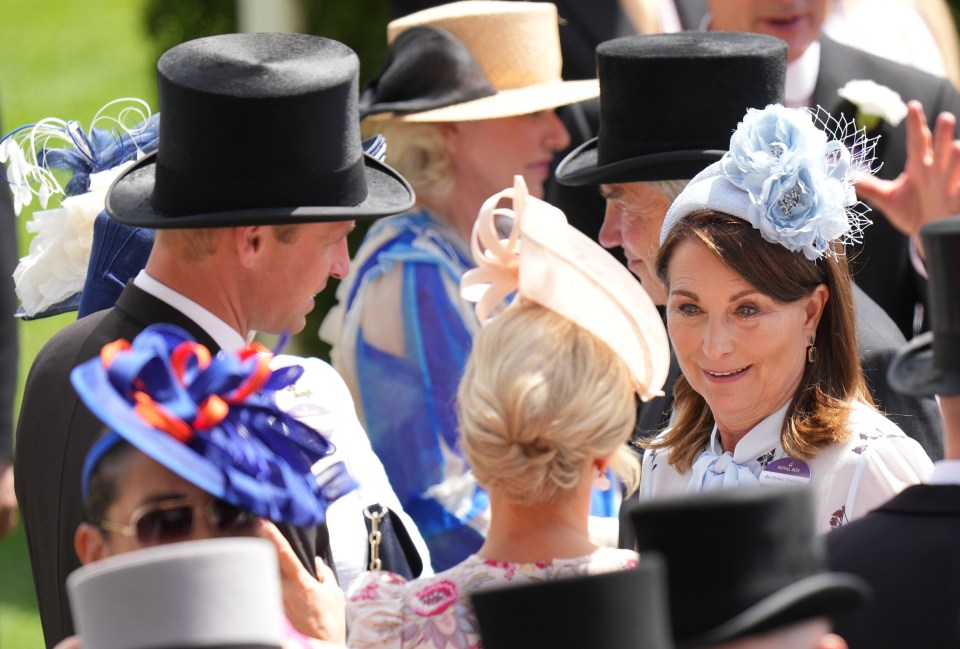 Carole Middleton chats to her son-in-law Prince William and Zara Tindall