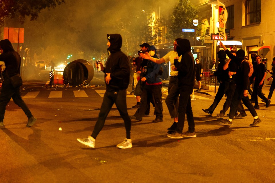 Protesters started fires and hurled fireworks at cops