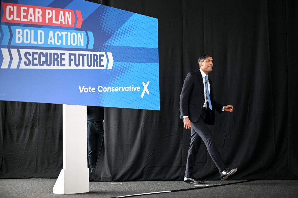 Mr Sunak walks on to the stage for the Conservative Party's manifesto launch in Silverstone
