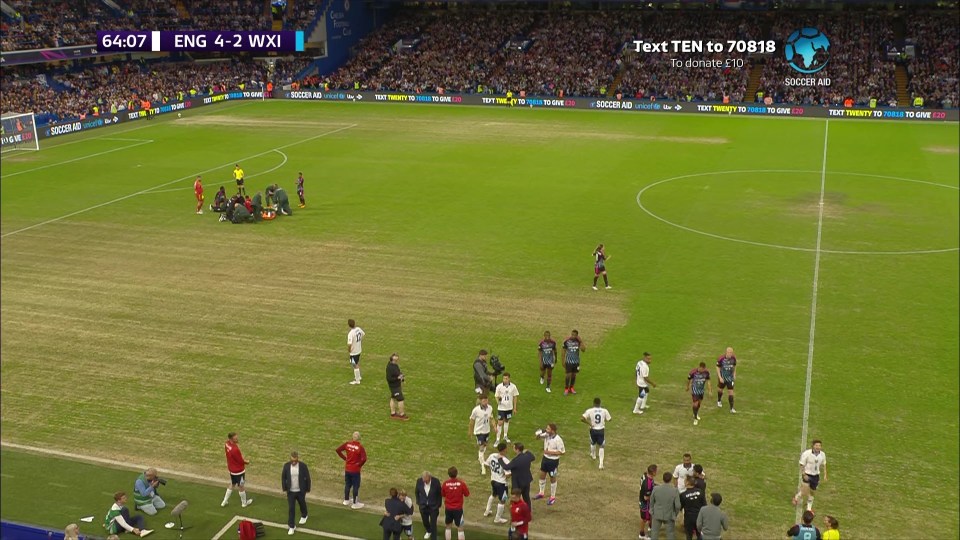 There was a delay as Bolt received treatment for the mystery injury