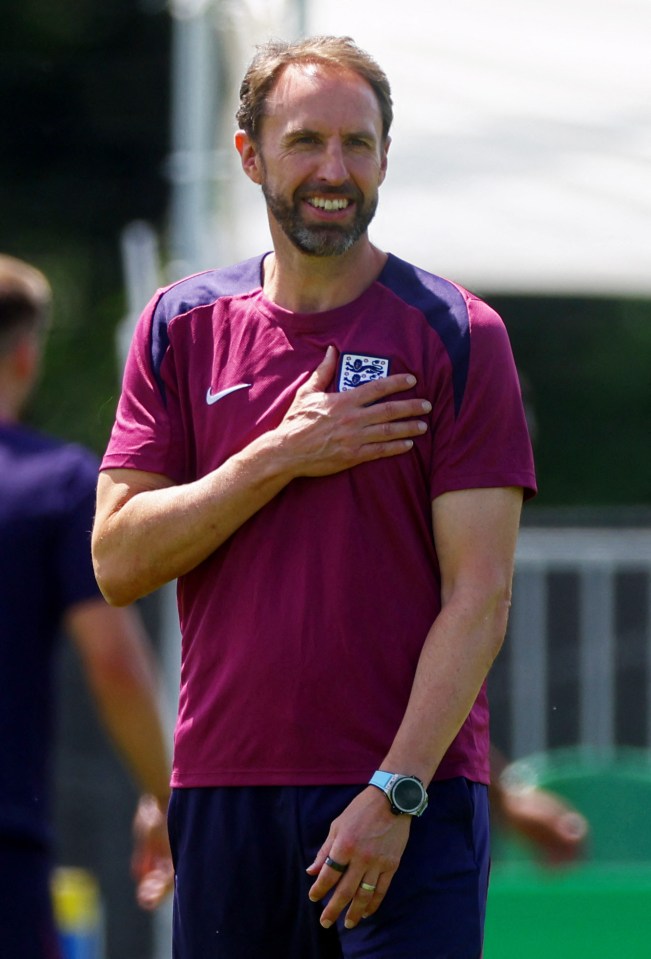 a man wearing a purple shirt that says england on it