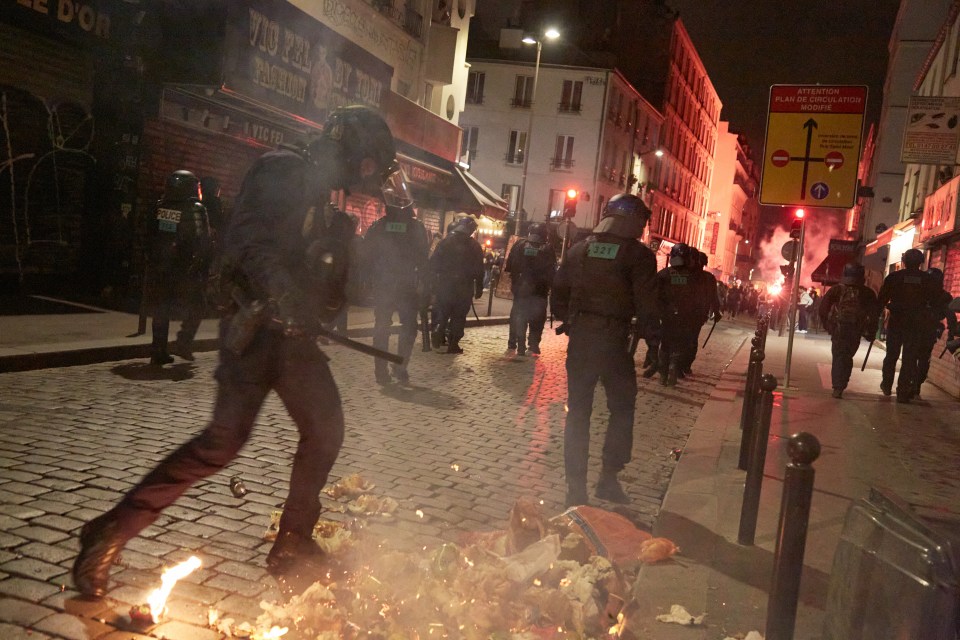 Riot cops attempted to contain crowds last Sunday