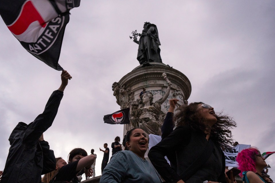 a statue with the word liberte on it