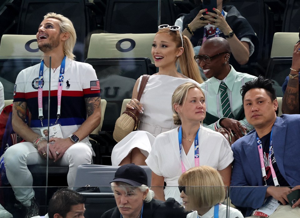 a man wearing a polo shirt that says usa on it