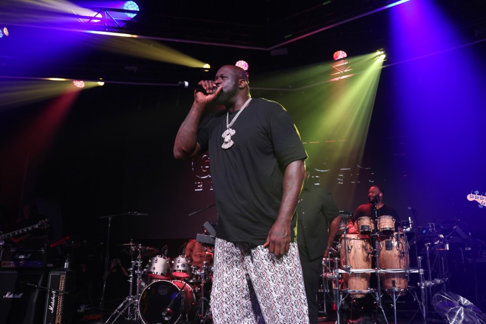 LONDON, ENGLAND - JULY 18: Shaquille O'Neal on stage during the UK Launch of 'Gin & Juice By Dre and Snoop' at Flipper's Roller Boogie Palace on July 18, 2024 in London, England. (Photo by Kevin Mazur/Getty Images for Flipper's)