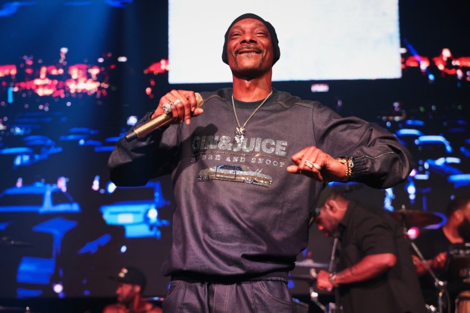Snoop Dogg at the UK Launch of 'Gin & Juice By Dre and Snoop' at Flipper's Roller Boogie Palace, London on July 18, 2024 in London, England. (Photo by Christopher Polk/Billboard via Getty Images)