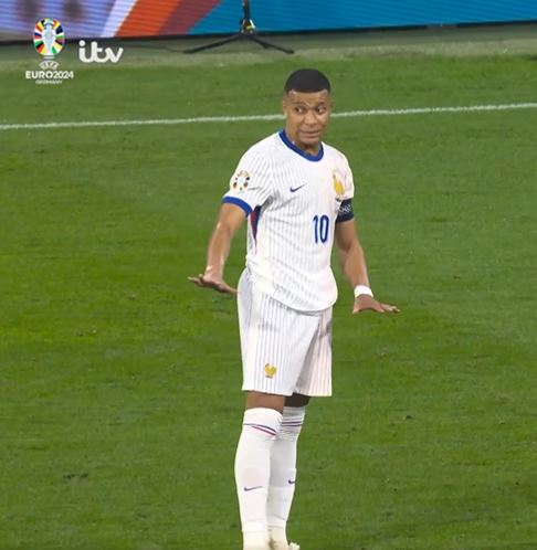Kylian Mbappe was charged at by a pitch invader
